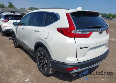 2018 Honda Cr-V Touring z USA, uszkodzony, nr VIN 2HKRW2H98JH668055